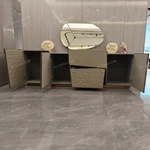 Asymmetrical Beige Sideboard with Embossed Textured Panels, Angled Drawer Fronts and Satin Bronze Frame